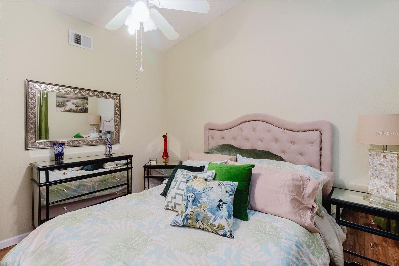 Secondary bedroom With Luxury Vinyl Flooring