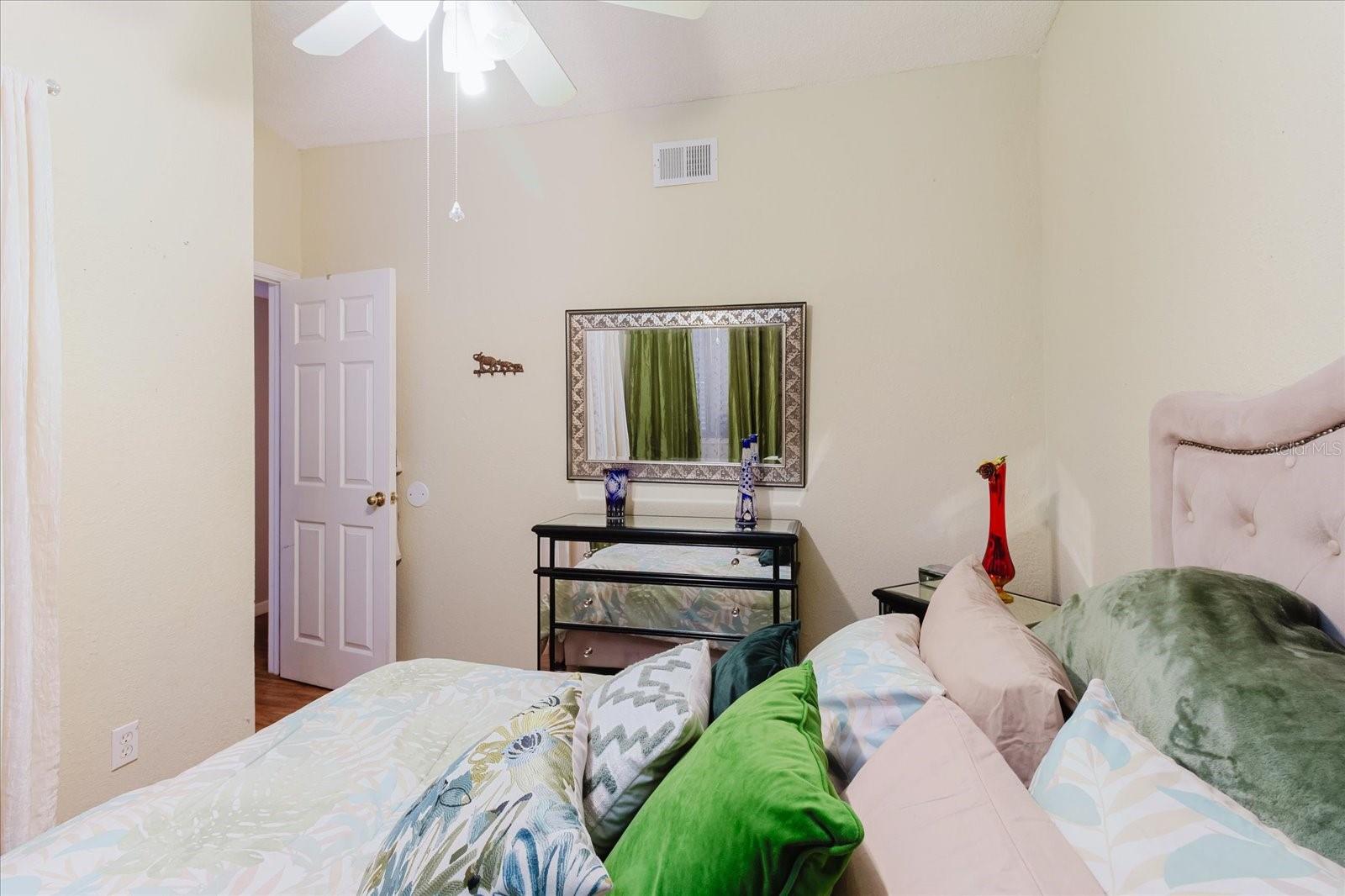 Secondary bedroom With Luxury Vinyl Flooring