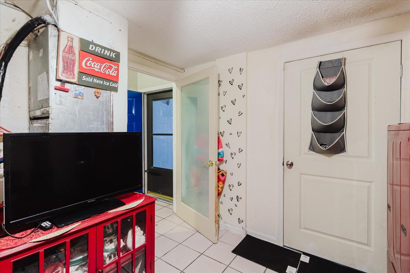 Main Floor Laundry With Title Floors, Right Off the Garage