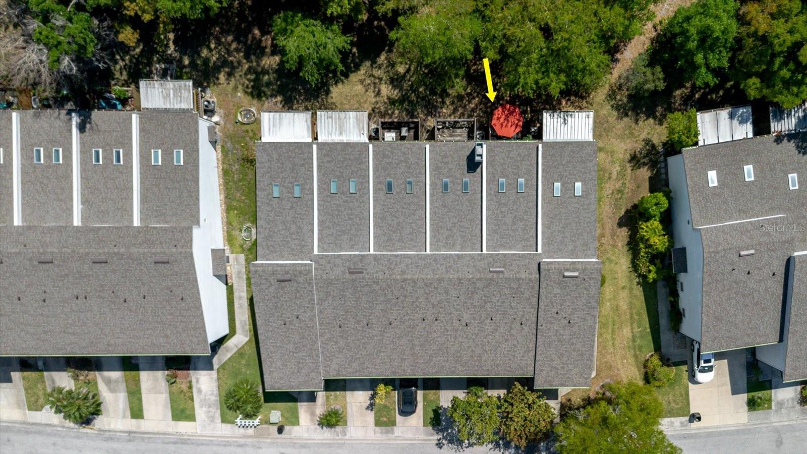 Aerial View of Property, Red Umbrella Marks the Rear Balcony
