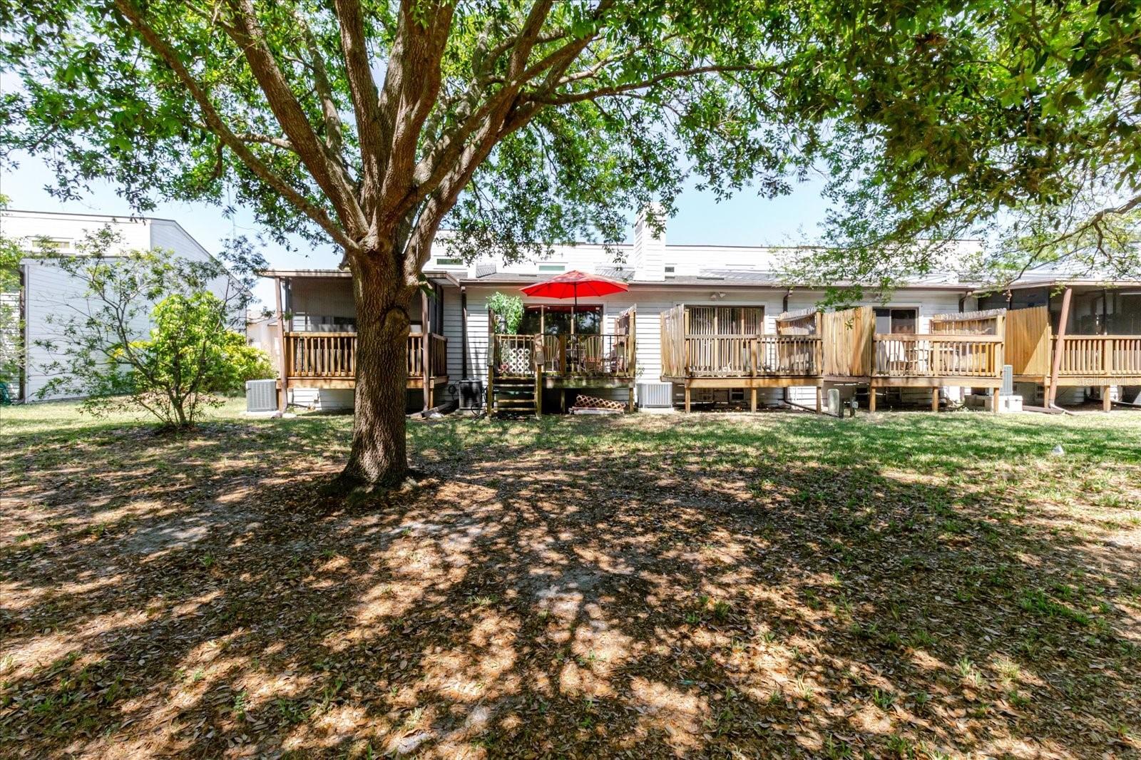 Rear View of the Townhouse. Read Umbrella Marks the Property