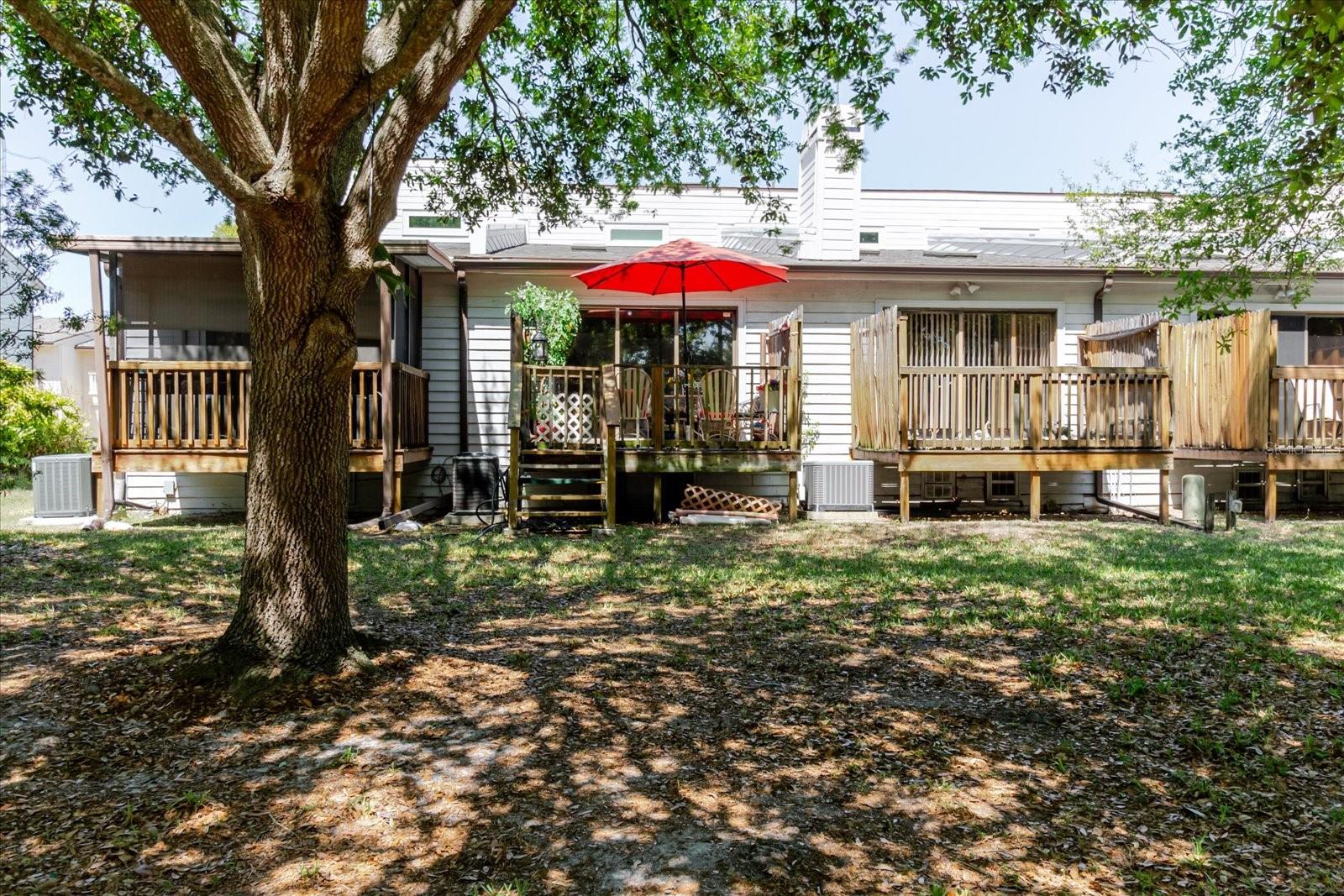 Rear View of the Townhouse. Read Umbrella Marks the Property