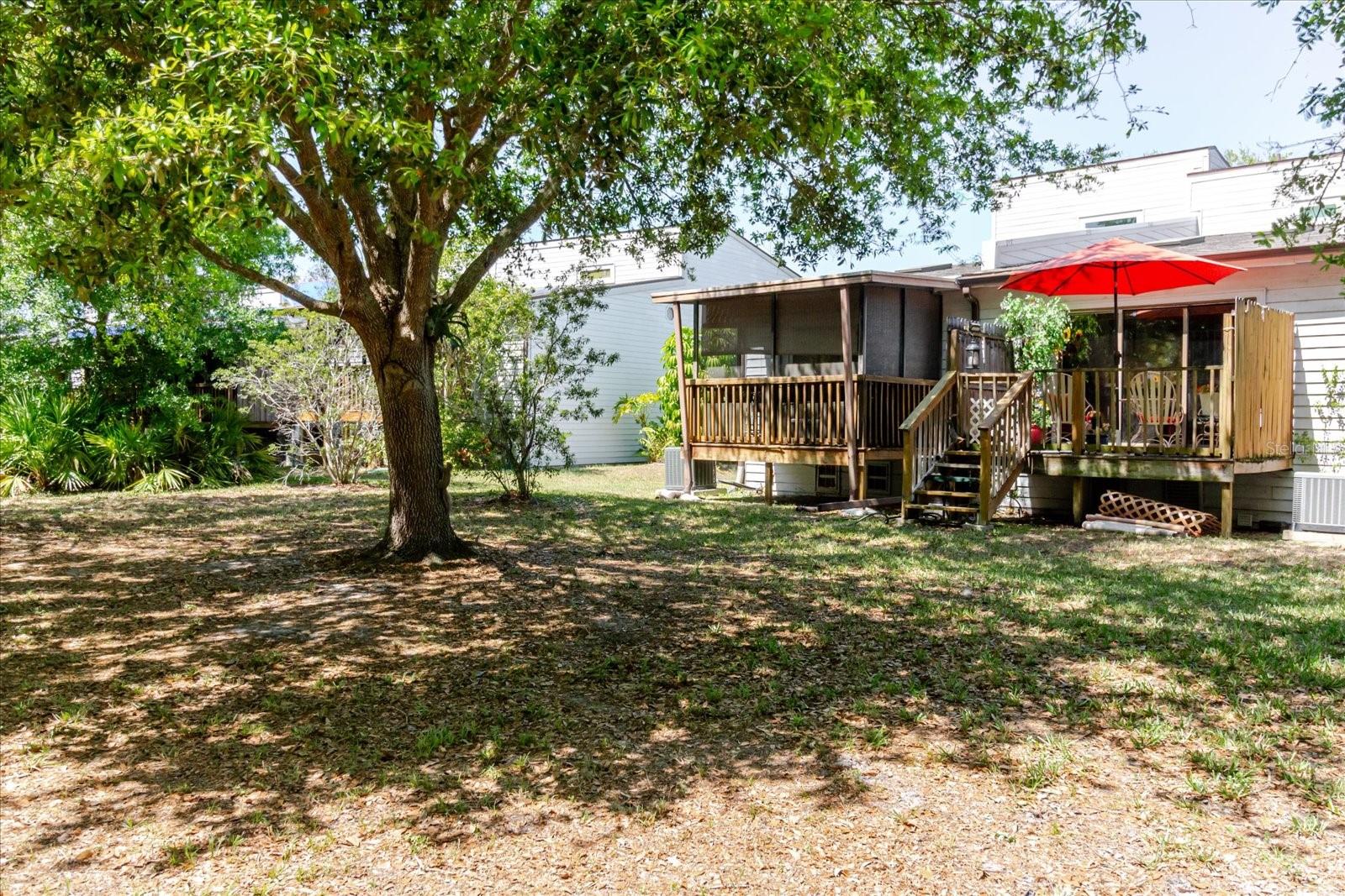 Rear View of the Townhouse. Read Umbrella Marks the Property