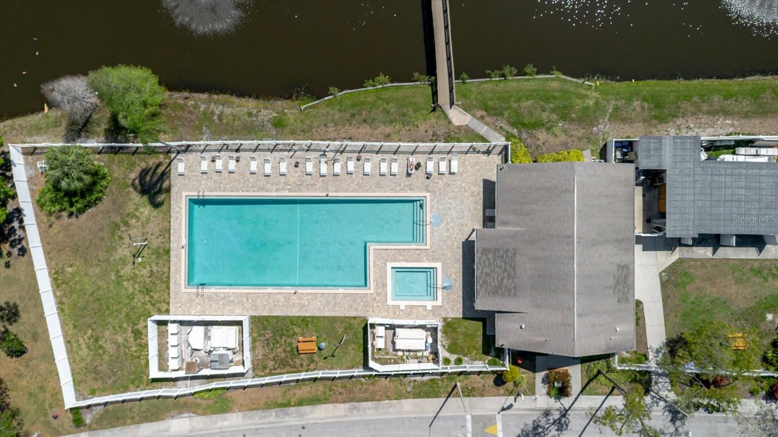 Aerial View of the Canal, the Community Pool, and the Clubhouse