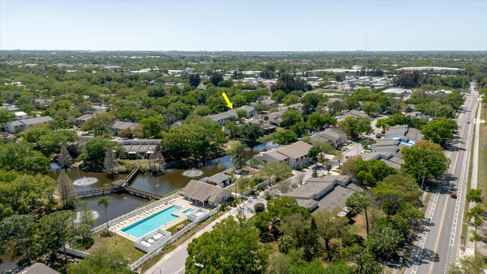 Aerial View of the Canal, the Community Pool, and the Clubhouse