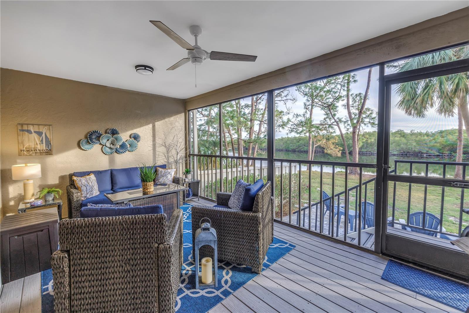 Outdoor Screened Porch has a roof which provides shade and a comfortable all-weather vista