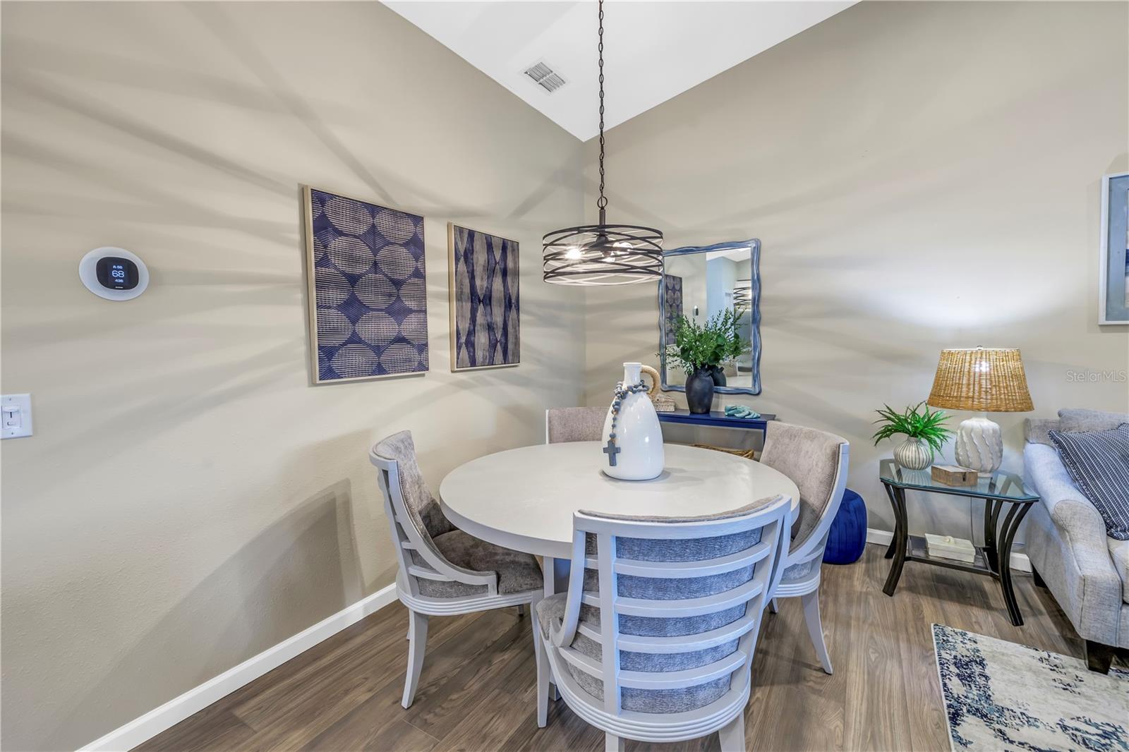 Open Floor Plan with Dining Space under the High Vaulted Ceiling