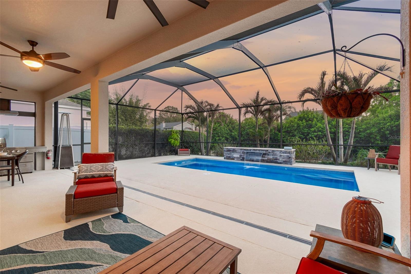 Covered Lanai overlooking pool at twilight