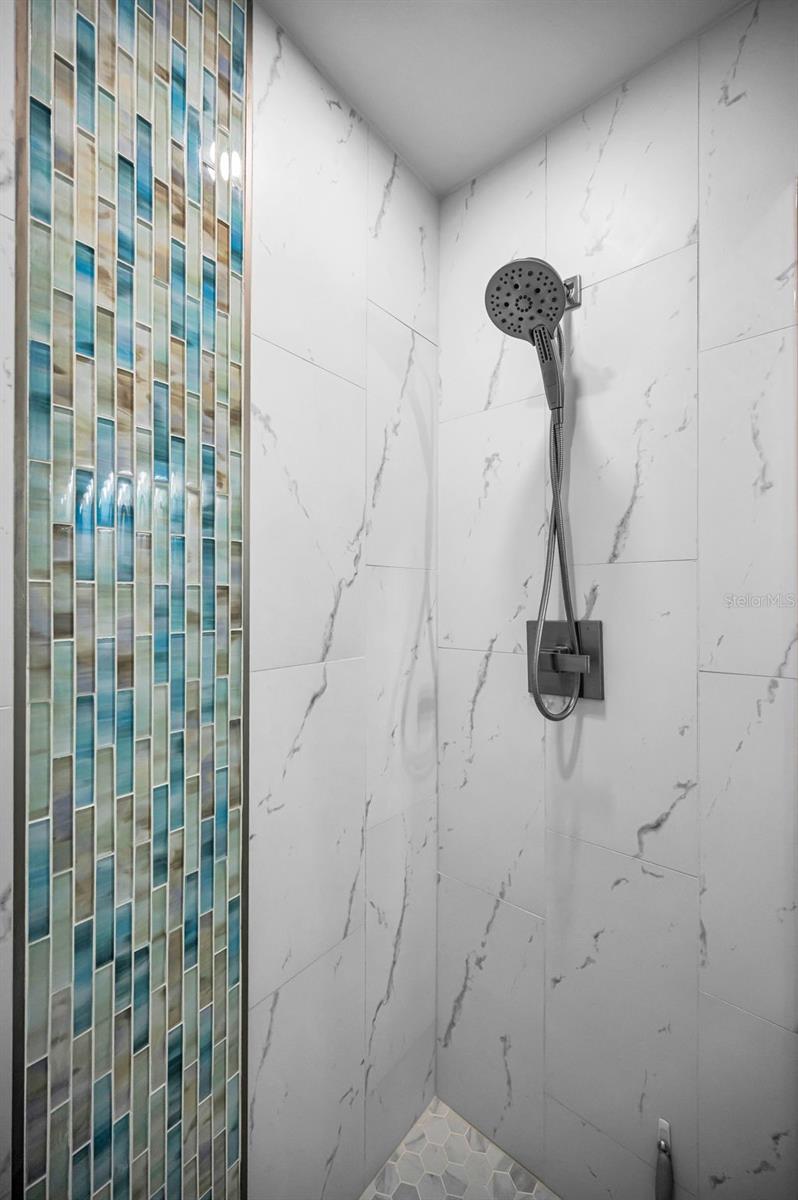 Utility closet with full sized washer & dryer