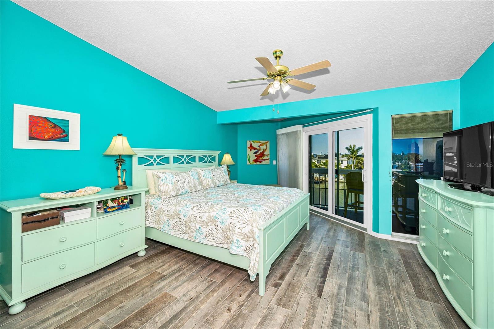 Sliding glass door to the private, Primary bedroom balcony