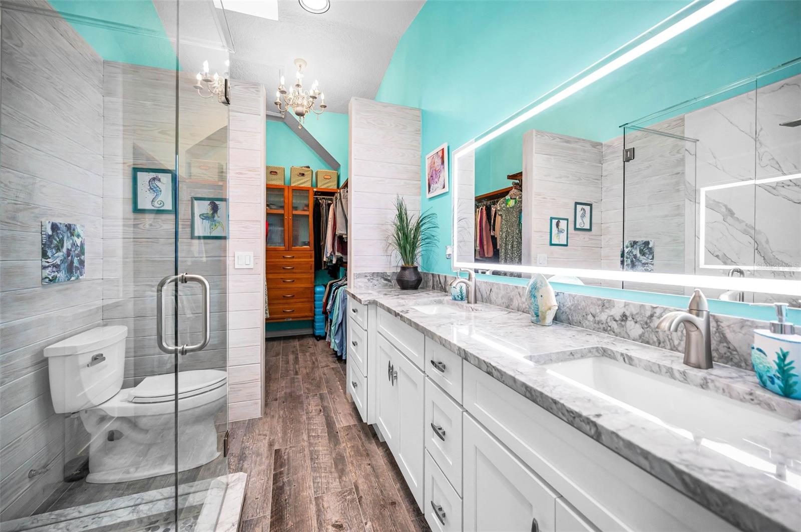 A top-to-bottom renovated primary suite bath with refined, modern detailing