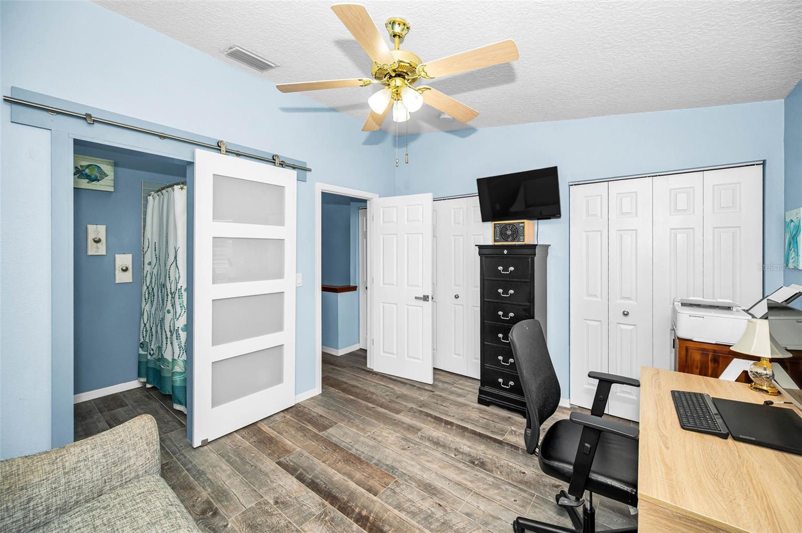 Full ensuite bath connected to the second bedroom on the upper level