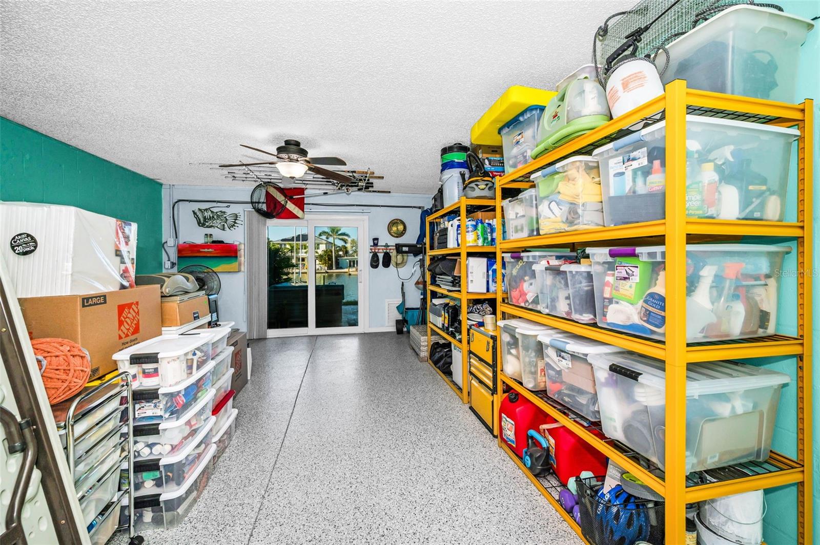 Paver Waterfront Patio just outside the garage on the lower level