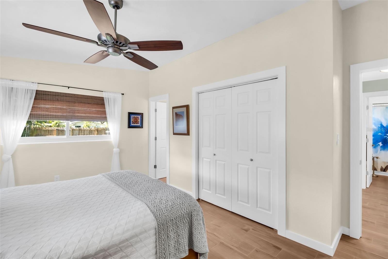 Vaulted ceilings, large built-in closet, and convenient en-suite half bath~