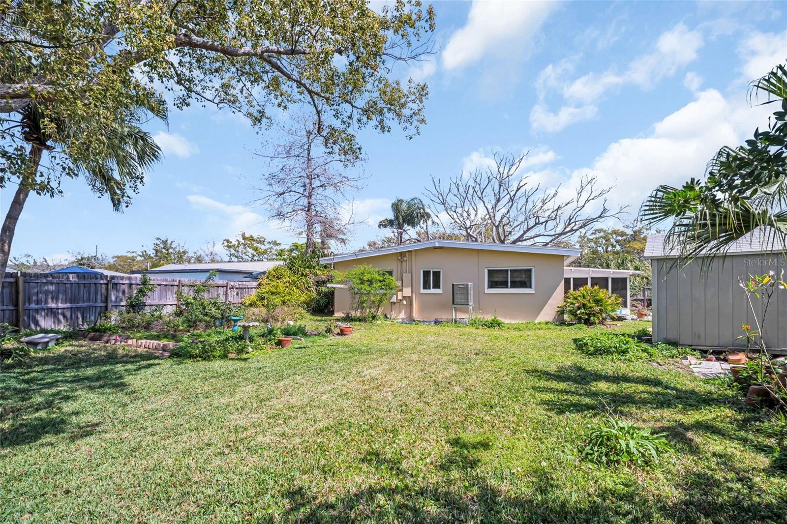 Private garden area, open green spaces, and fire-pit area~