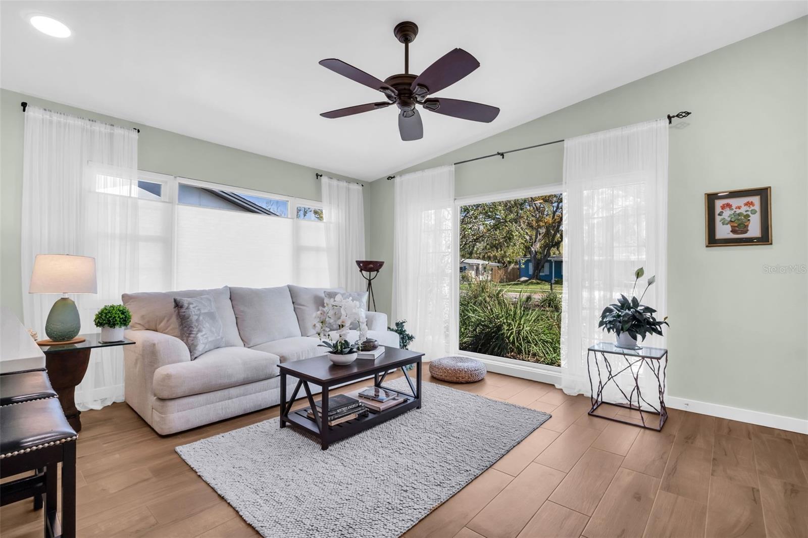 Stunning floor to ceiling hurricane-impact windows~