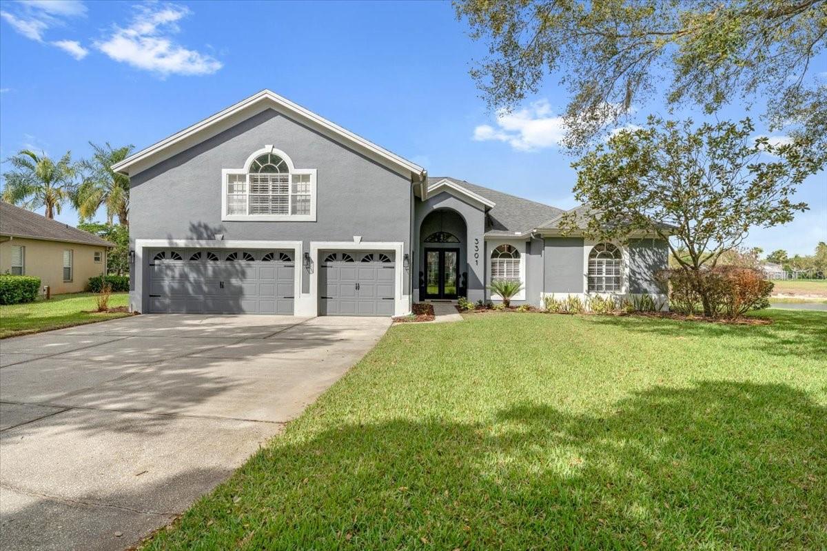 Stunning executive home located in the gated River Hills golf course community.