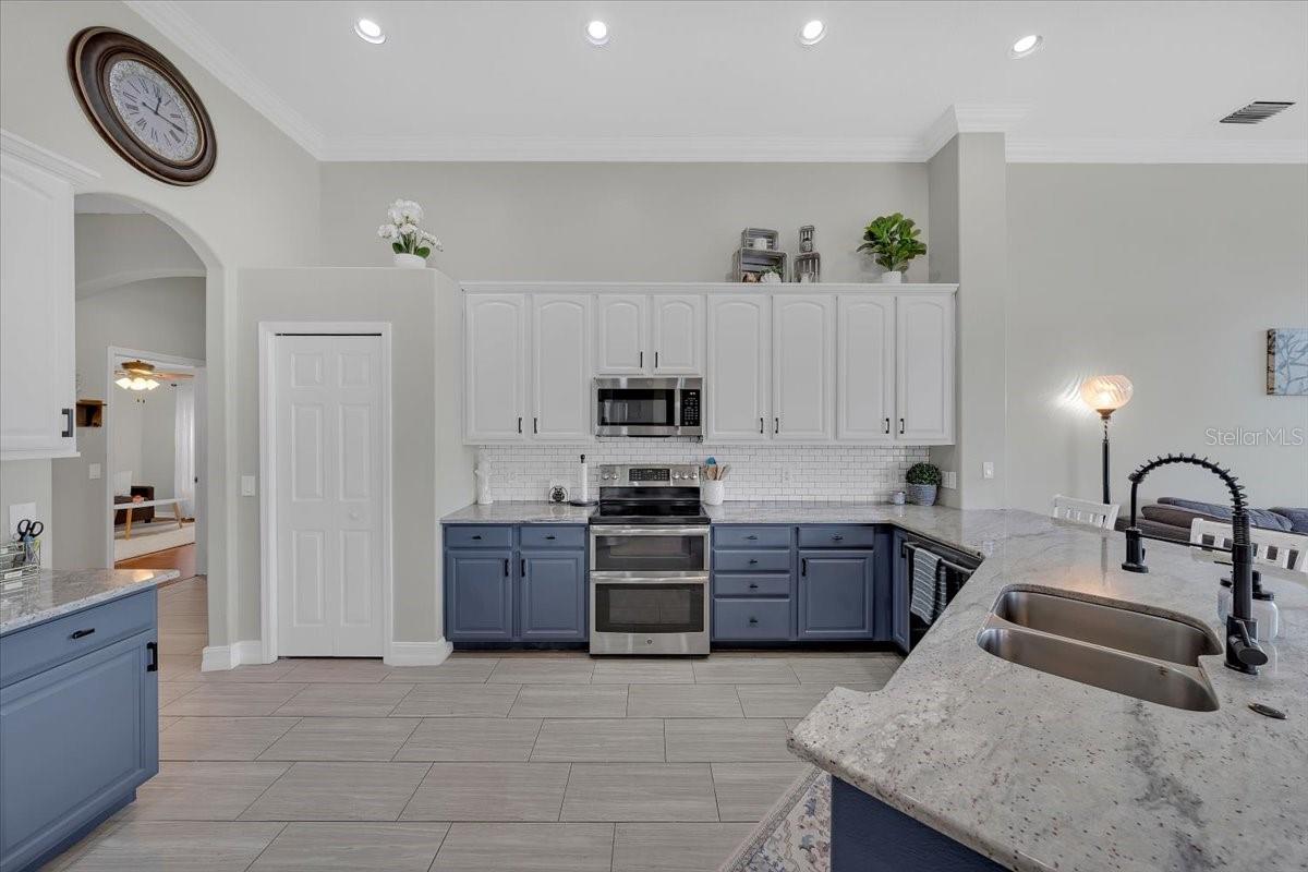 Two-toned cabinetry providing abundant storage.