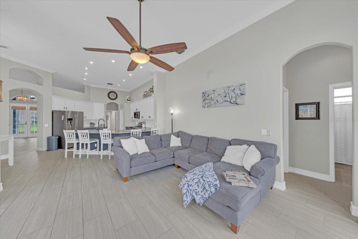 Family room offers wood laminate flooring and newer ceiling fans!