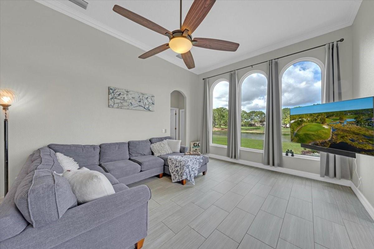Newly installed windows perfectly framing golf course and pond views.