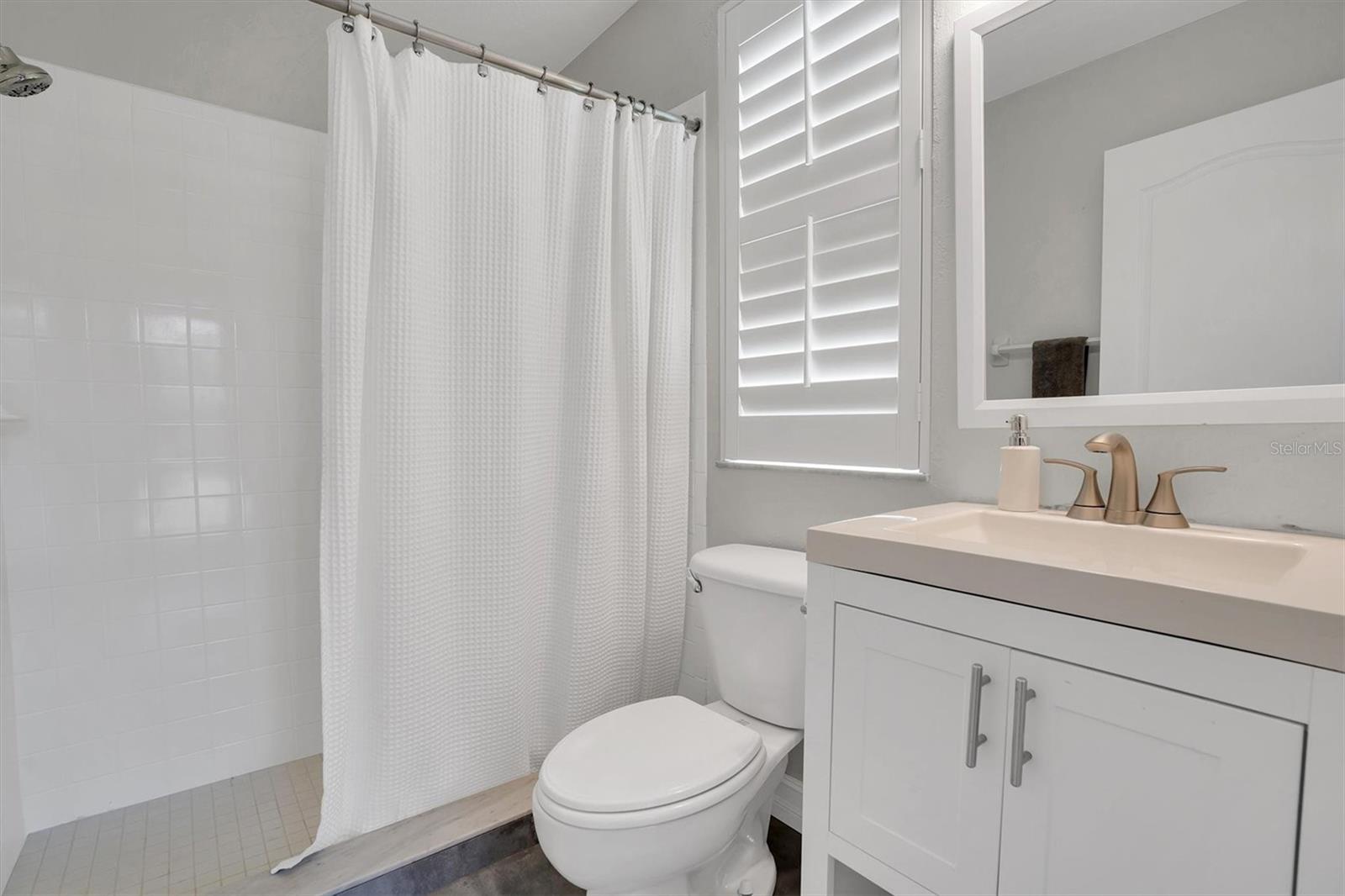 downstairs bathroom, pool entrance