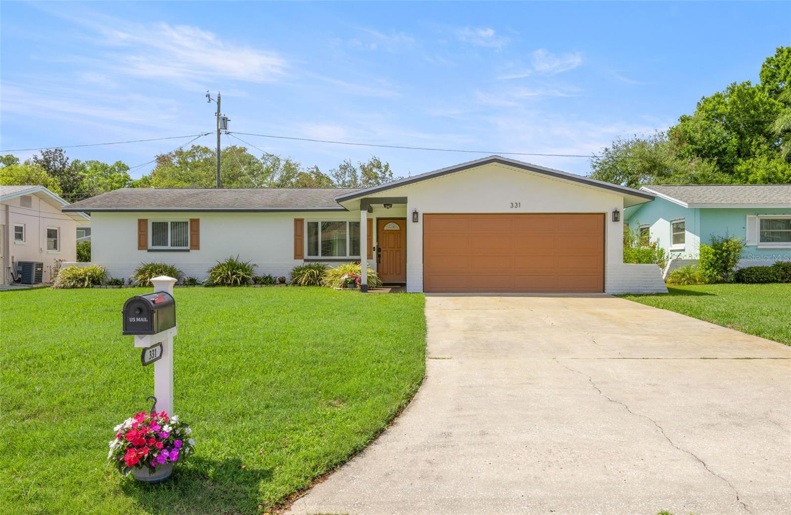 Great curb appeal, two car garage and plenty of driveway parking.