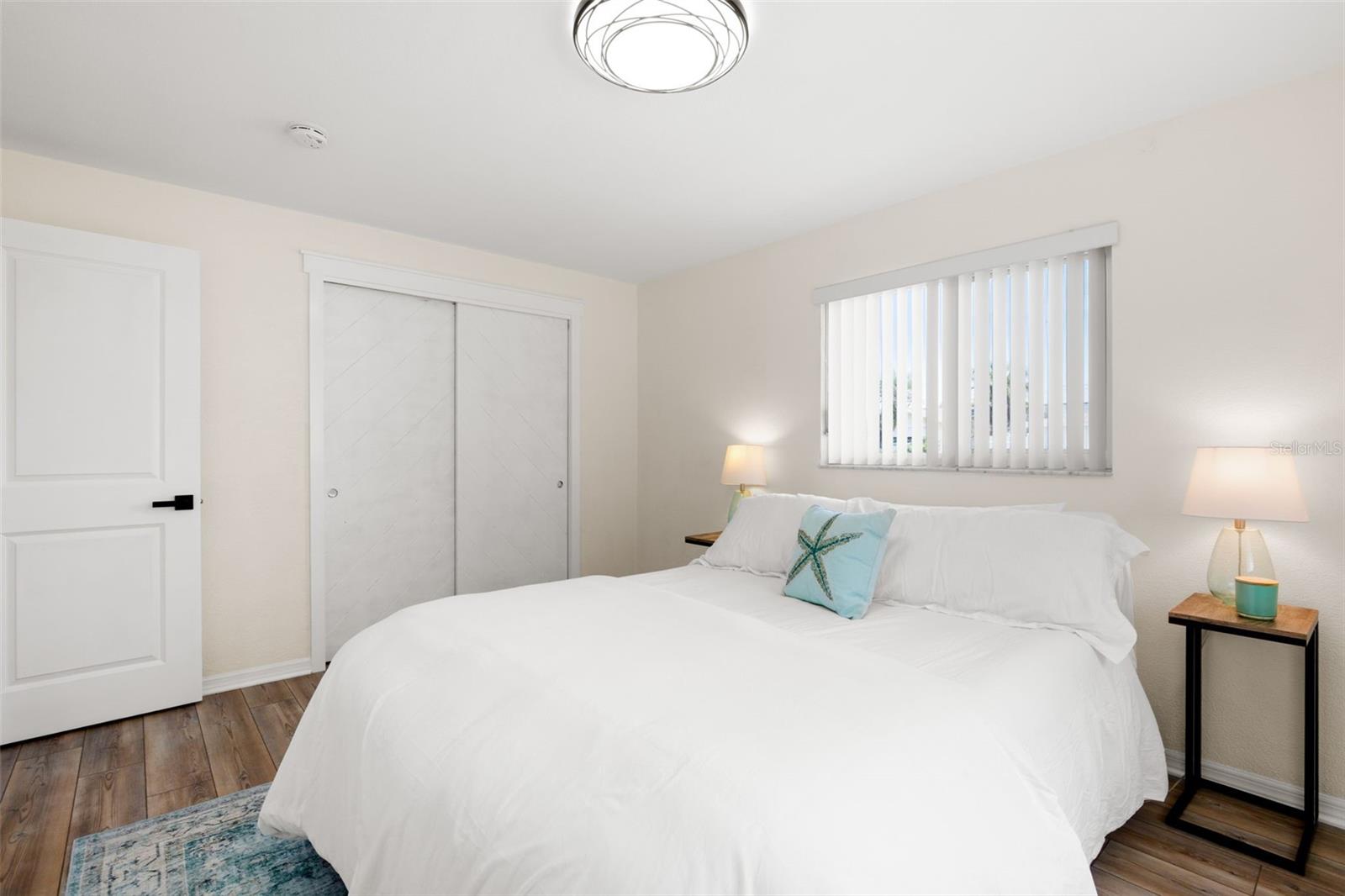 Primary bedroom with walk-in closet