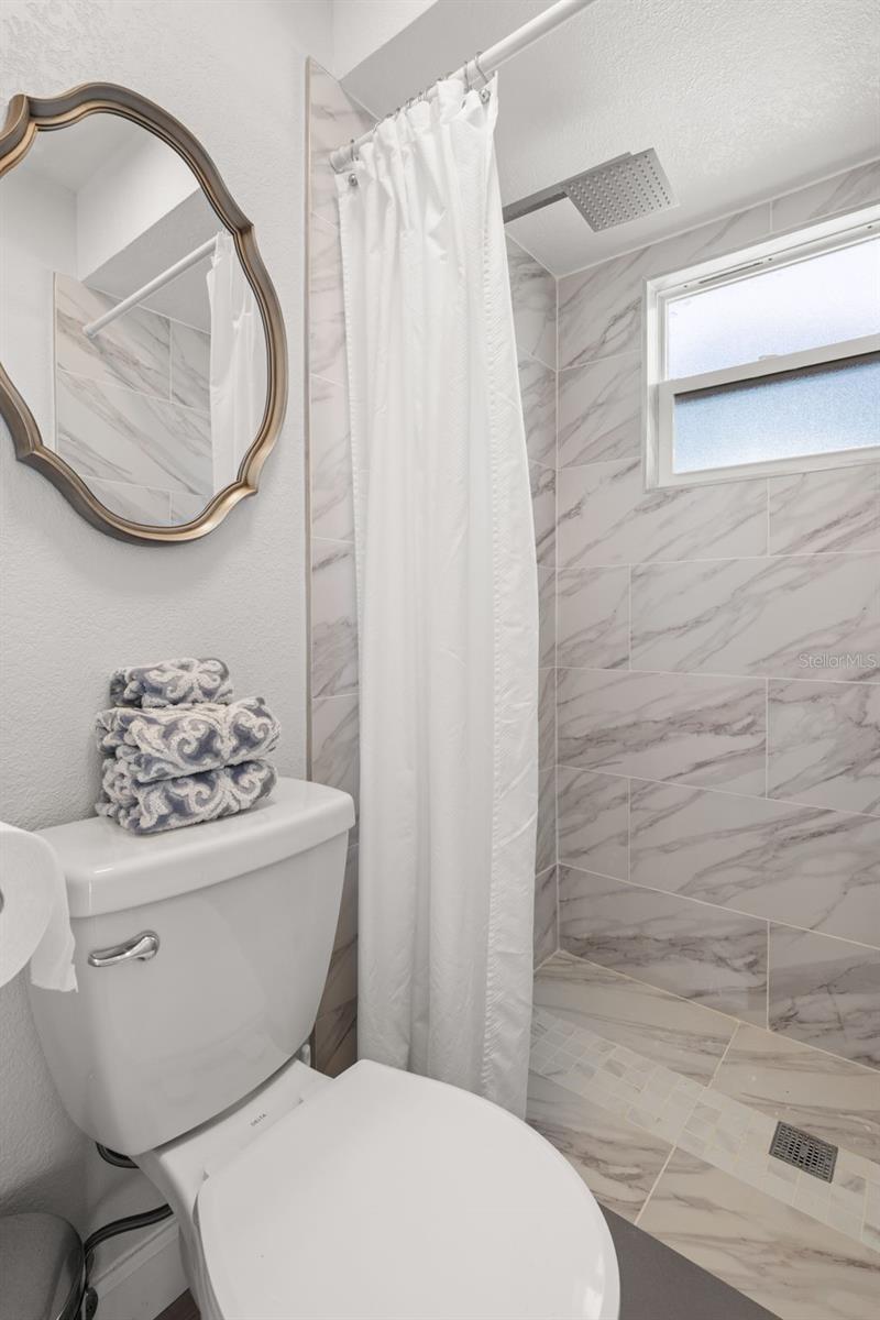 Second bath with walk-in shower.