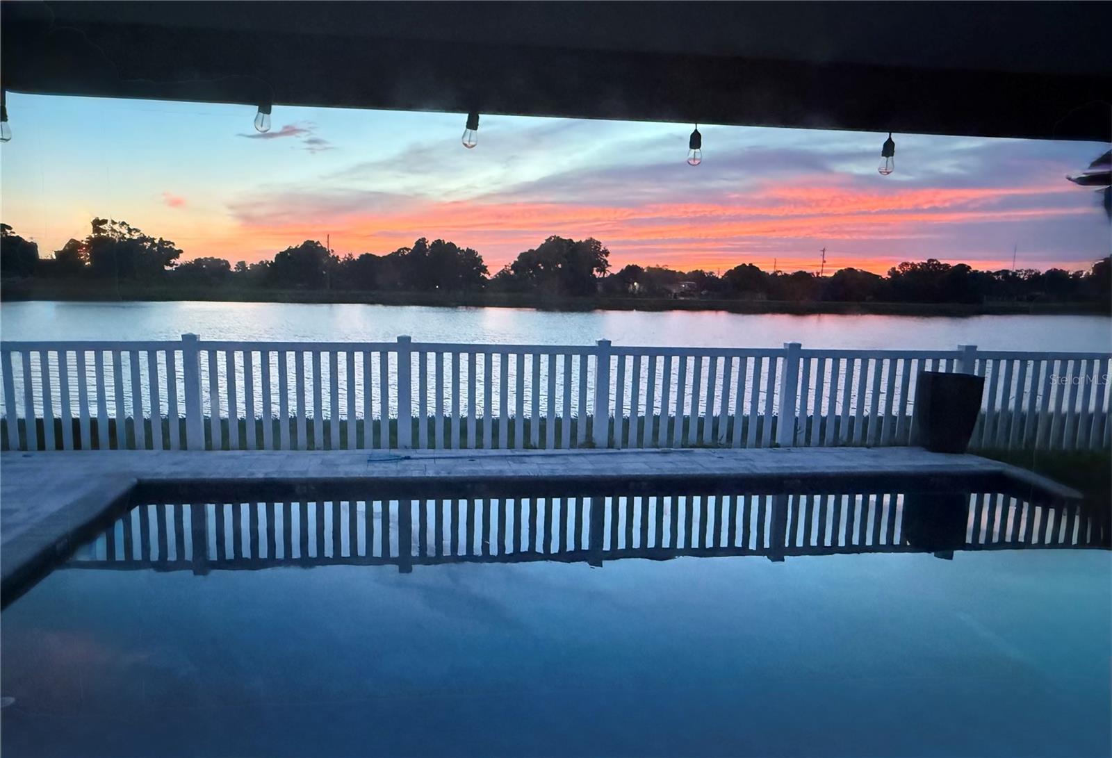 Sunset views from patio provided by seller.