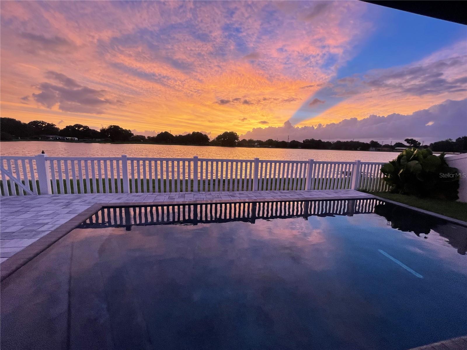 Sunset views from patio provided by seller.