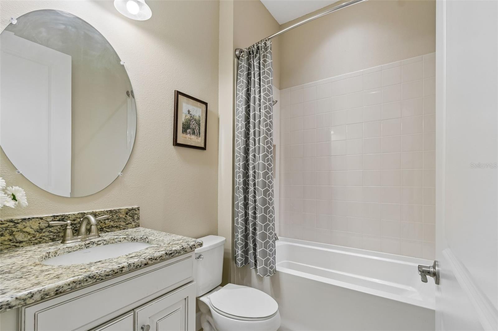 Hallway bath- adjacent to front door / bedroom 2