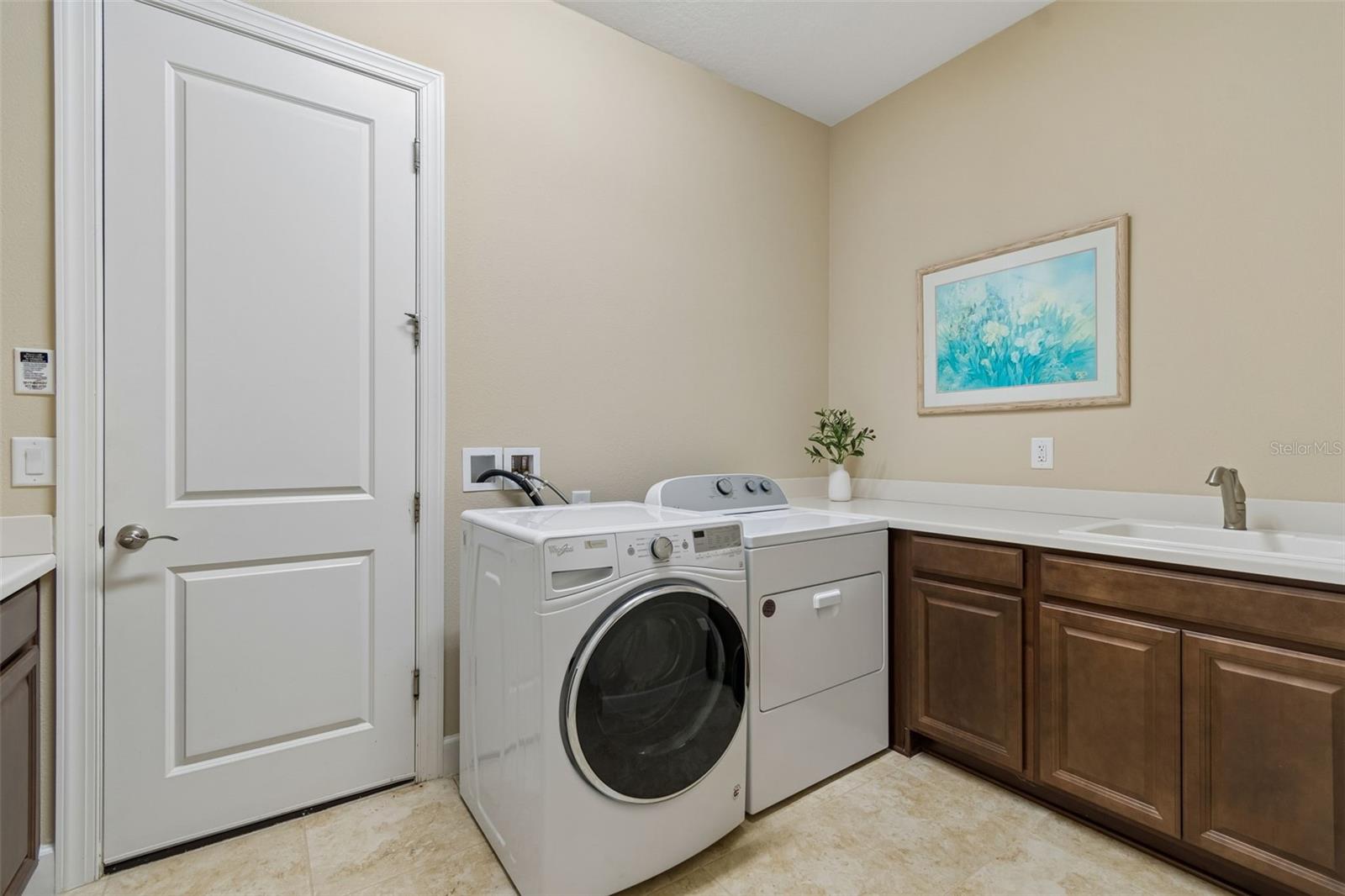 Dedicated laundry room with direct access to the garage.