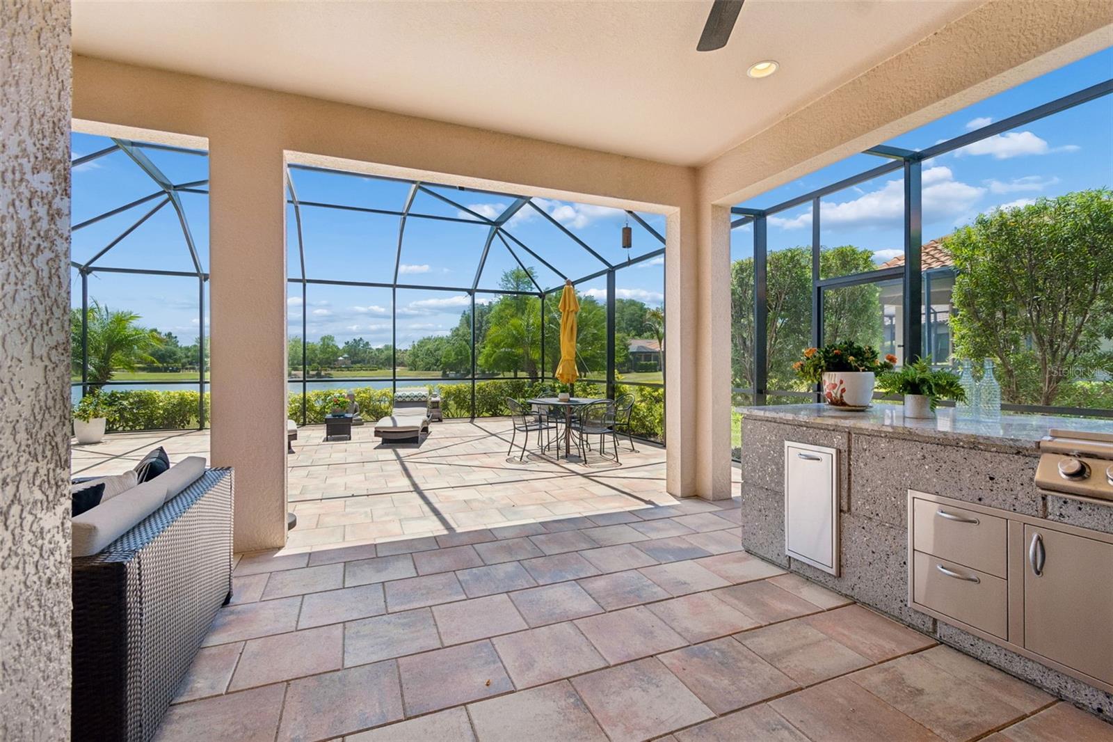 Expansive outdoor space ideal for relaxing, dining, and entertaining while enjoying water views.