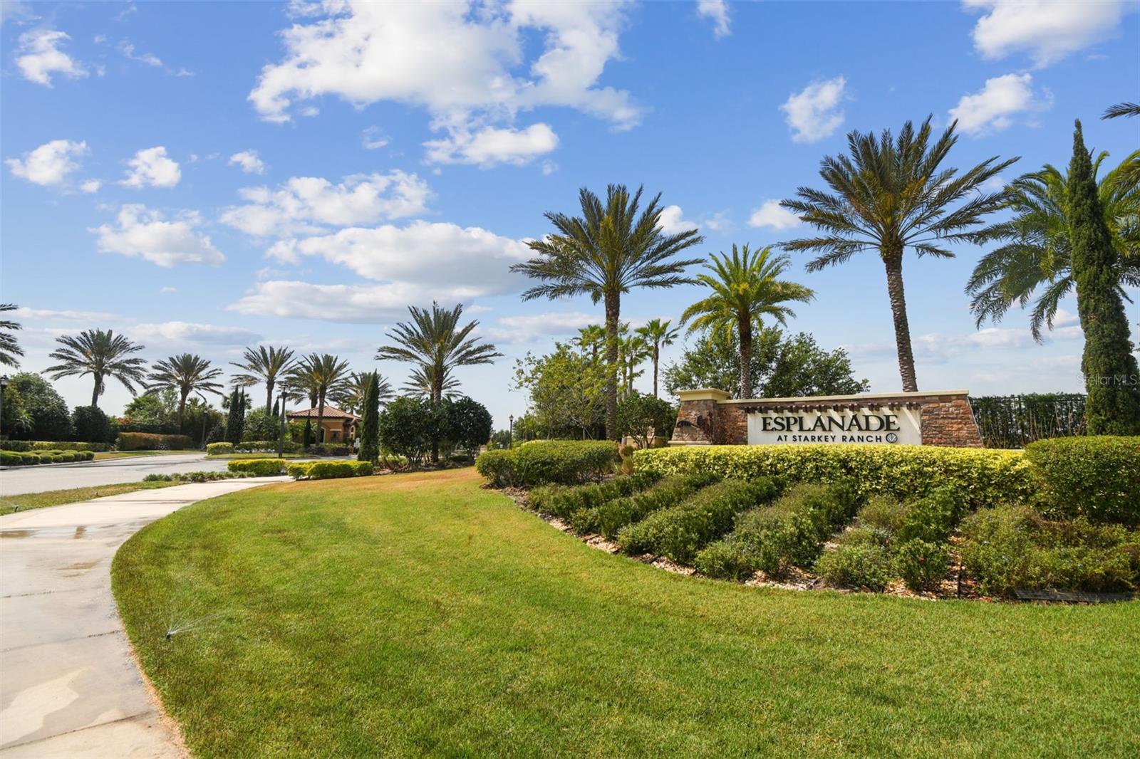 A rare combination of water views, outdoor living, and low-maintenance lifestyle in Starkey Ranch.
