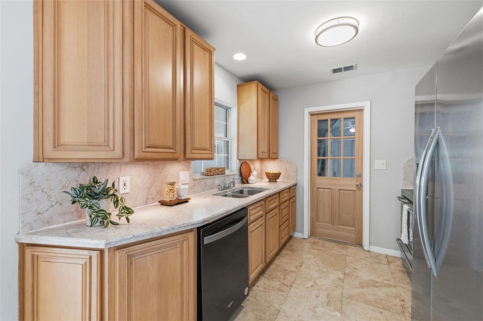 Ample cabinet storage and workspace for everyday cooking.