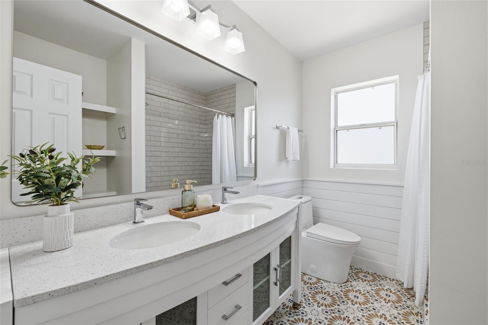 Additional bedroom offering flexible use as guest room or office.