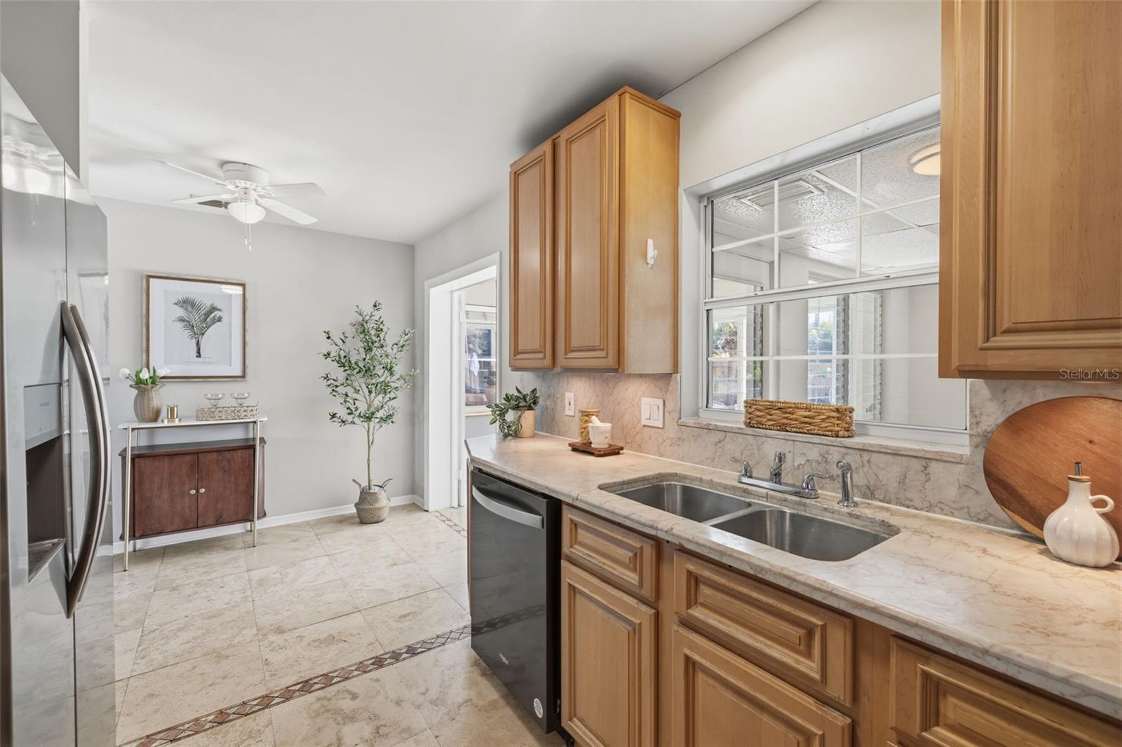 Kitchen with ample cabinetry and functional layout.