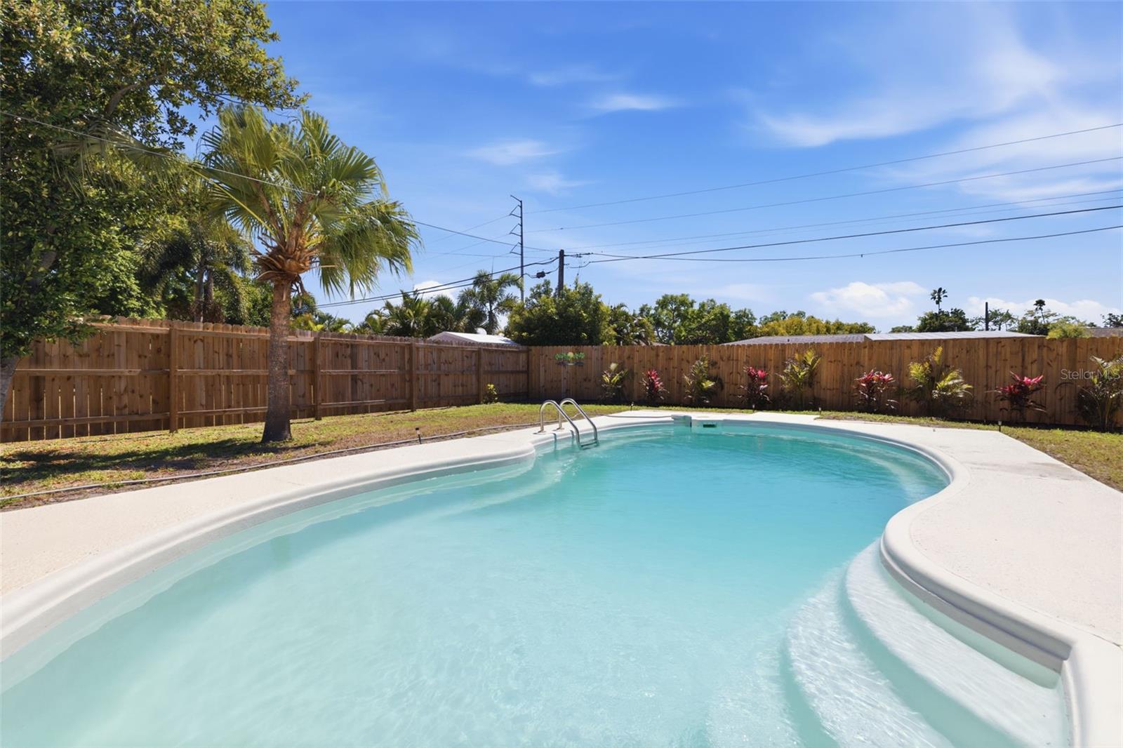 Inviting in-ground pool perfect for relaxing and entertaining.
