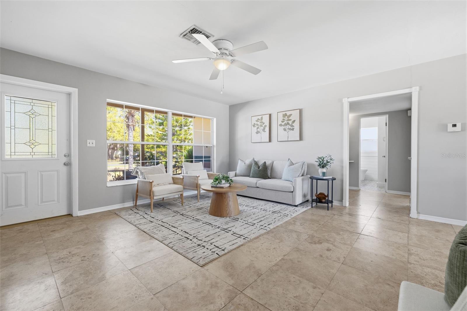 Open living space offering flexible furniture arrangements.