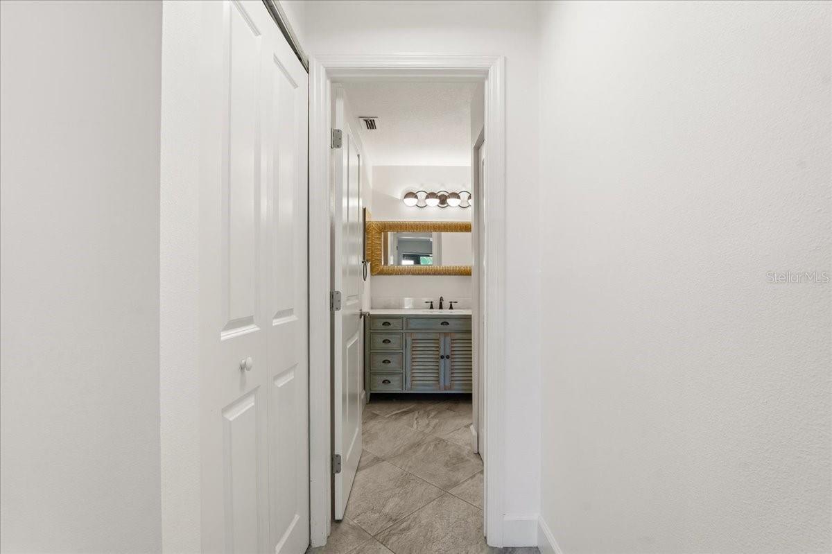 Hallway looking into updated bathroom