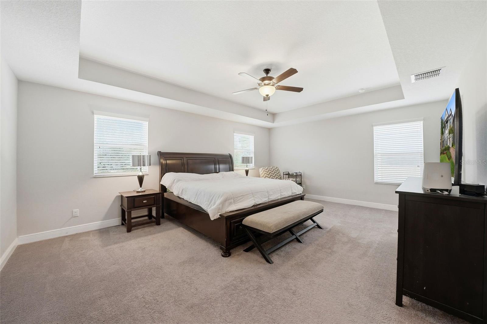 Bedroom 5, the primary suite, is generously oversized and designed as a true retreat, complete with a private en suite bathroom that offers both comfort and luxury.