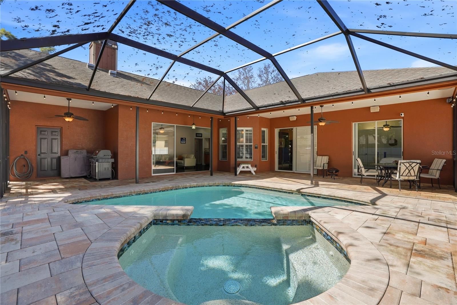 Pool with loads of covered space and deck space with heated spa