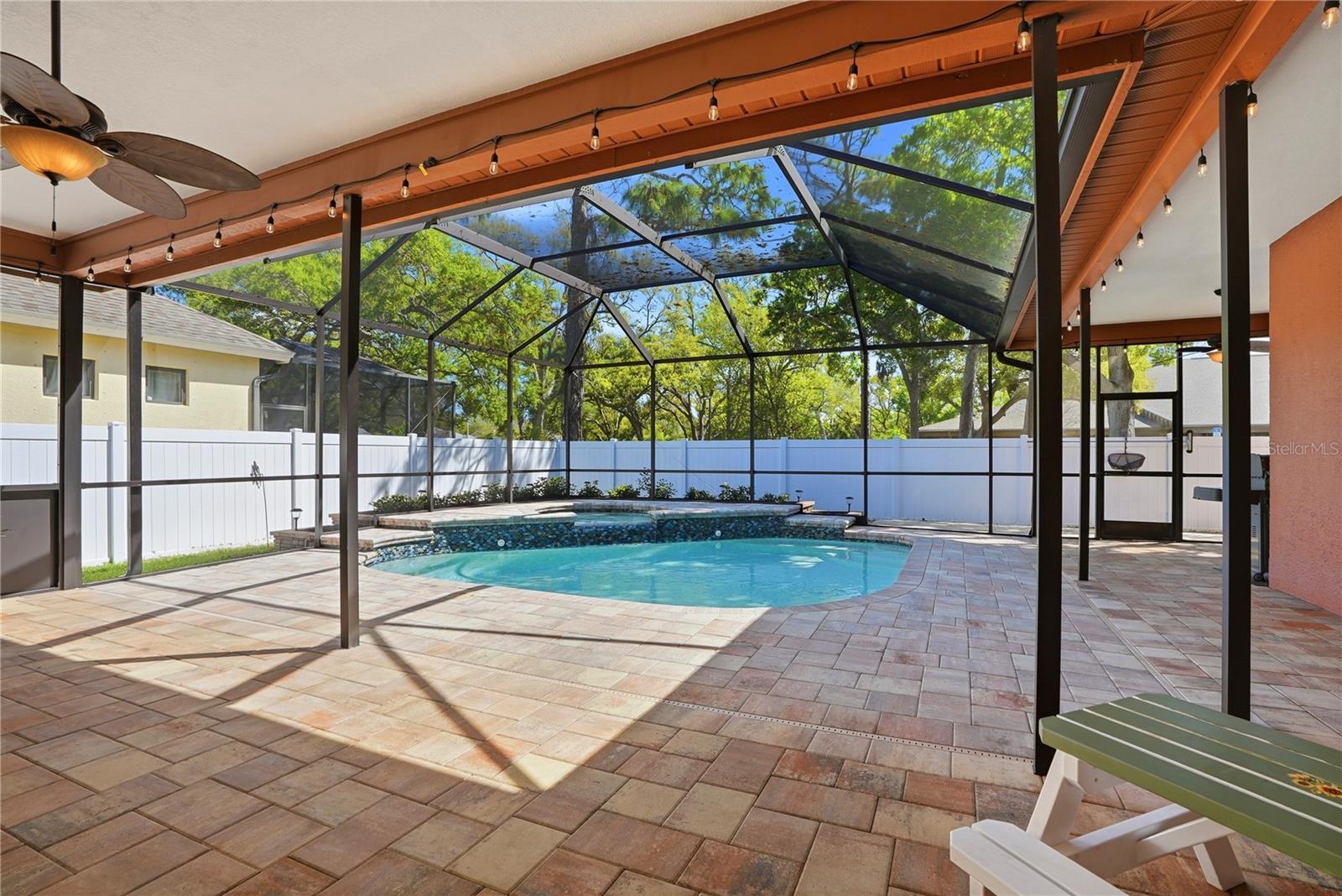 Pool deck with new brick pavers