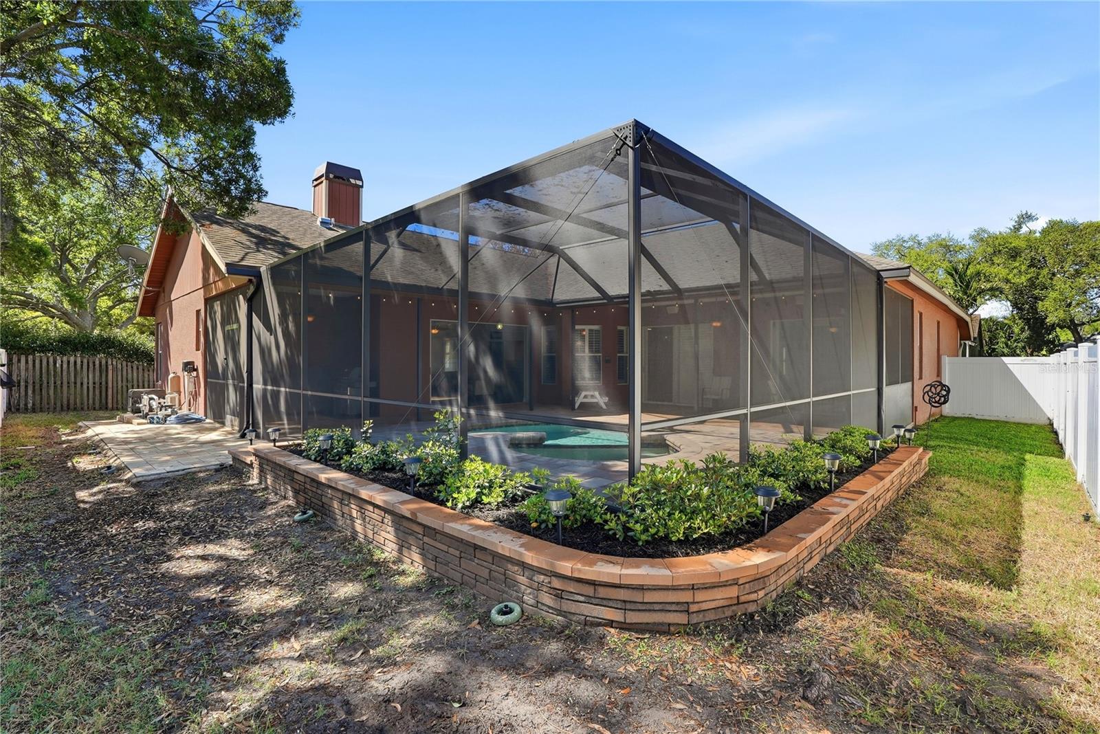 Back corner of yard showing that there is a side yard for our 4 legged friends