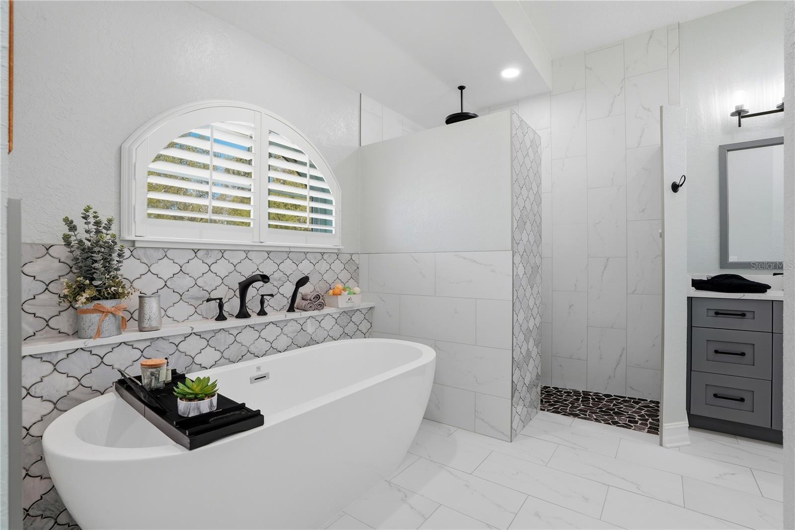 Deep soaker tub for Two with walk in rain shower