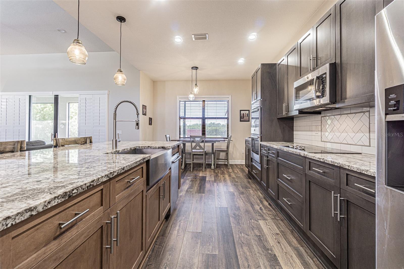 Galley kitchen with loads of cabinets
