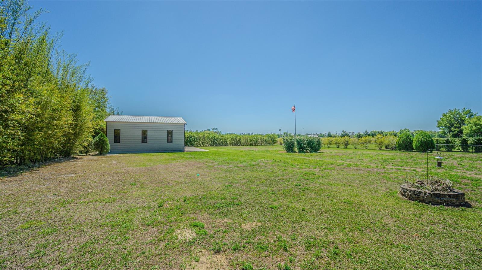 Private fenced backyard with firepit and Barn/Workshop/Storage