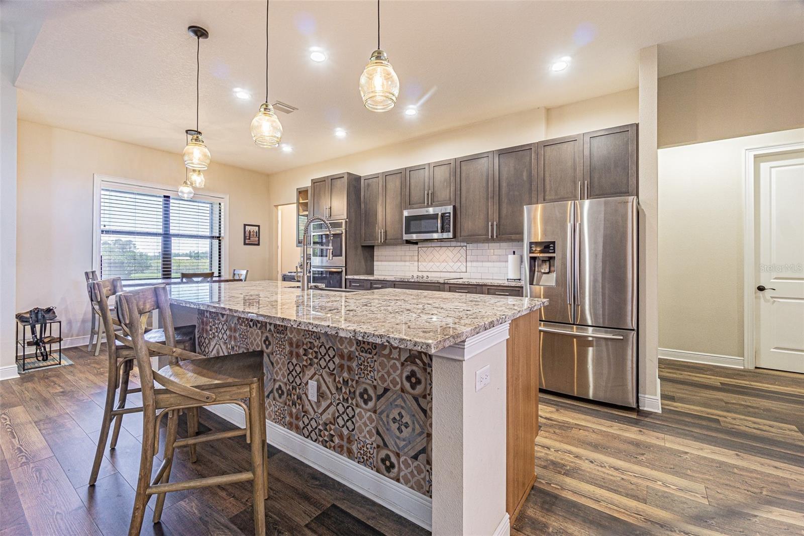 Stunning kitchen with center island and eat in dinette