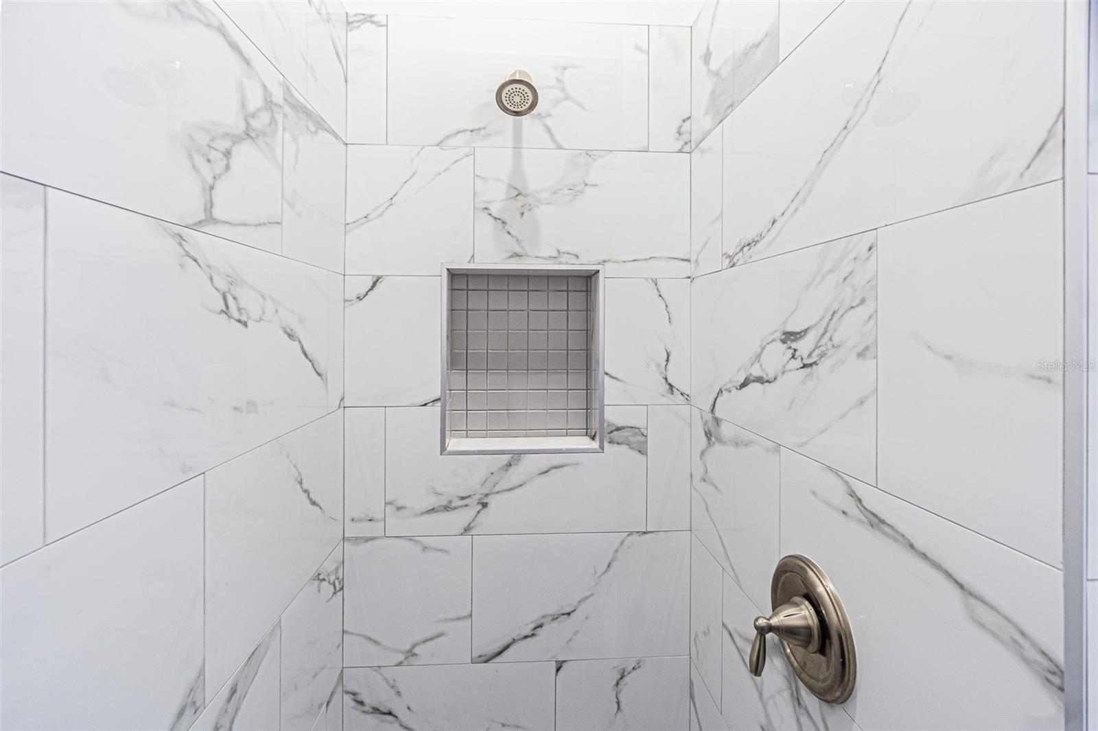 shower with seat and shampoo holder