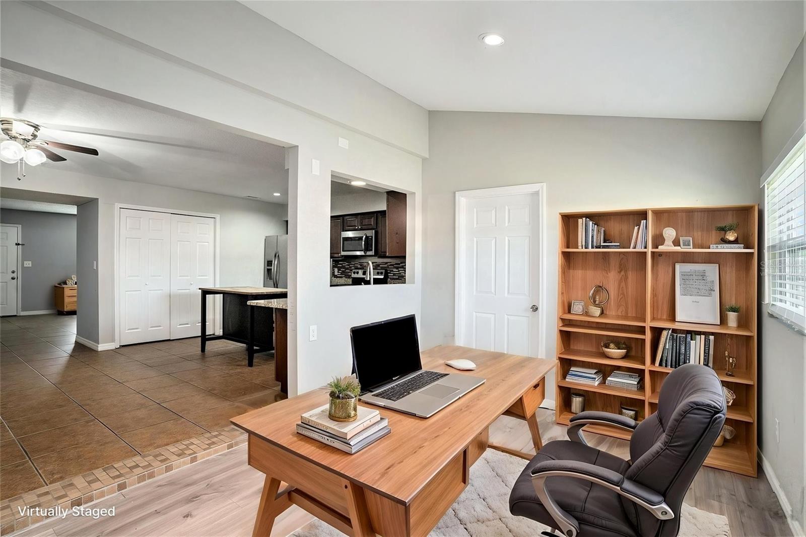 Virtually staged to show possibilities of an office in the bonus room